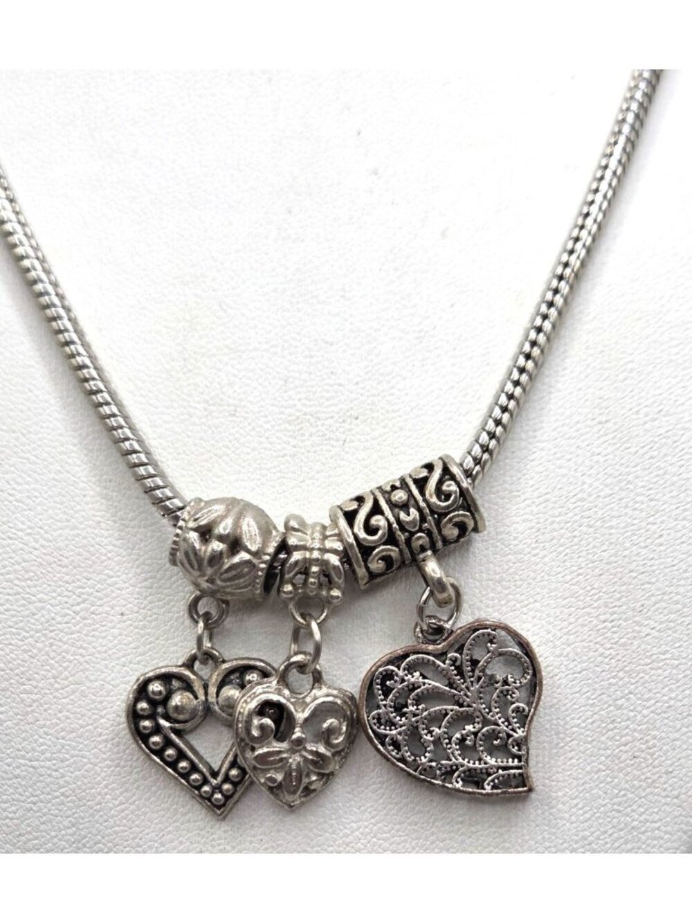 Silver Tone Heart Charm Necklace With LOVE Bead & Intricate Details
